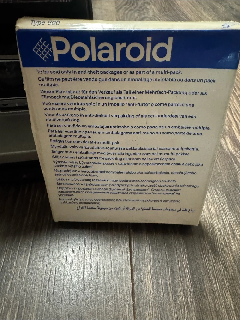 Polaroid Sun 600 with box of film